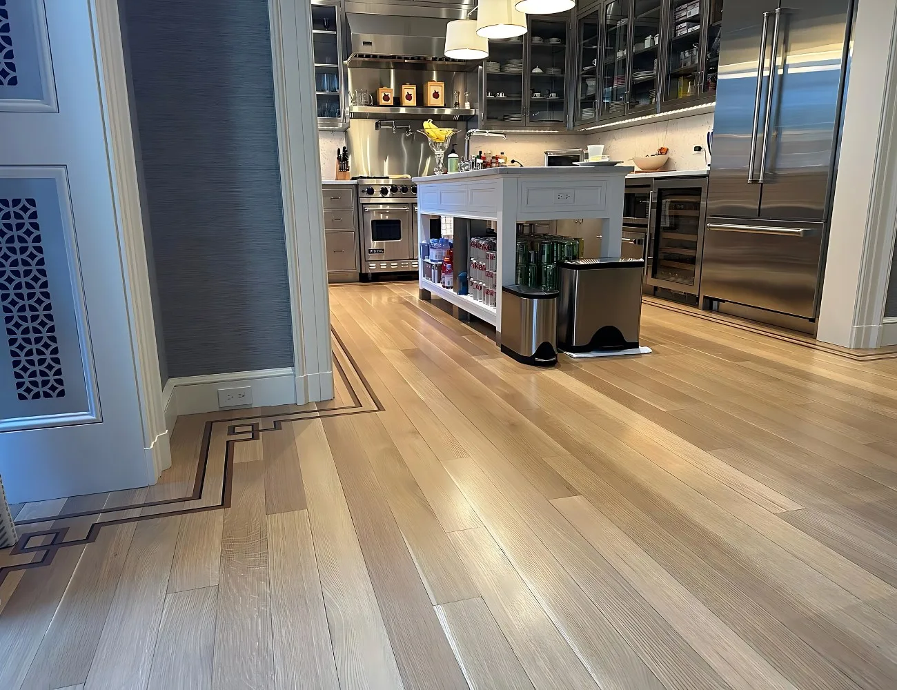 Fresh Hardwood Floors with a Border in a Chicago Kitchen