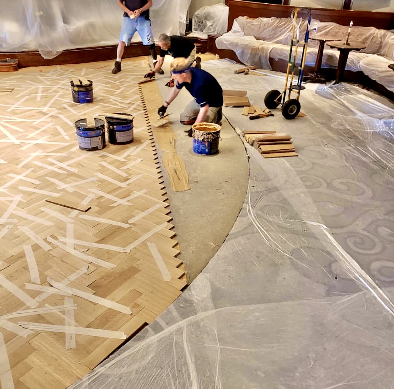 Reddys Hardwood Flooring installing a hardwood floor on a cruise ship.