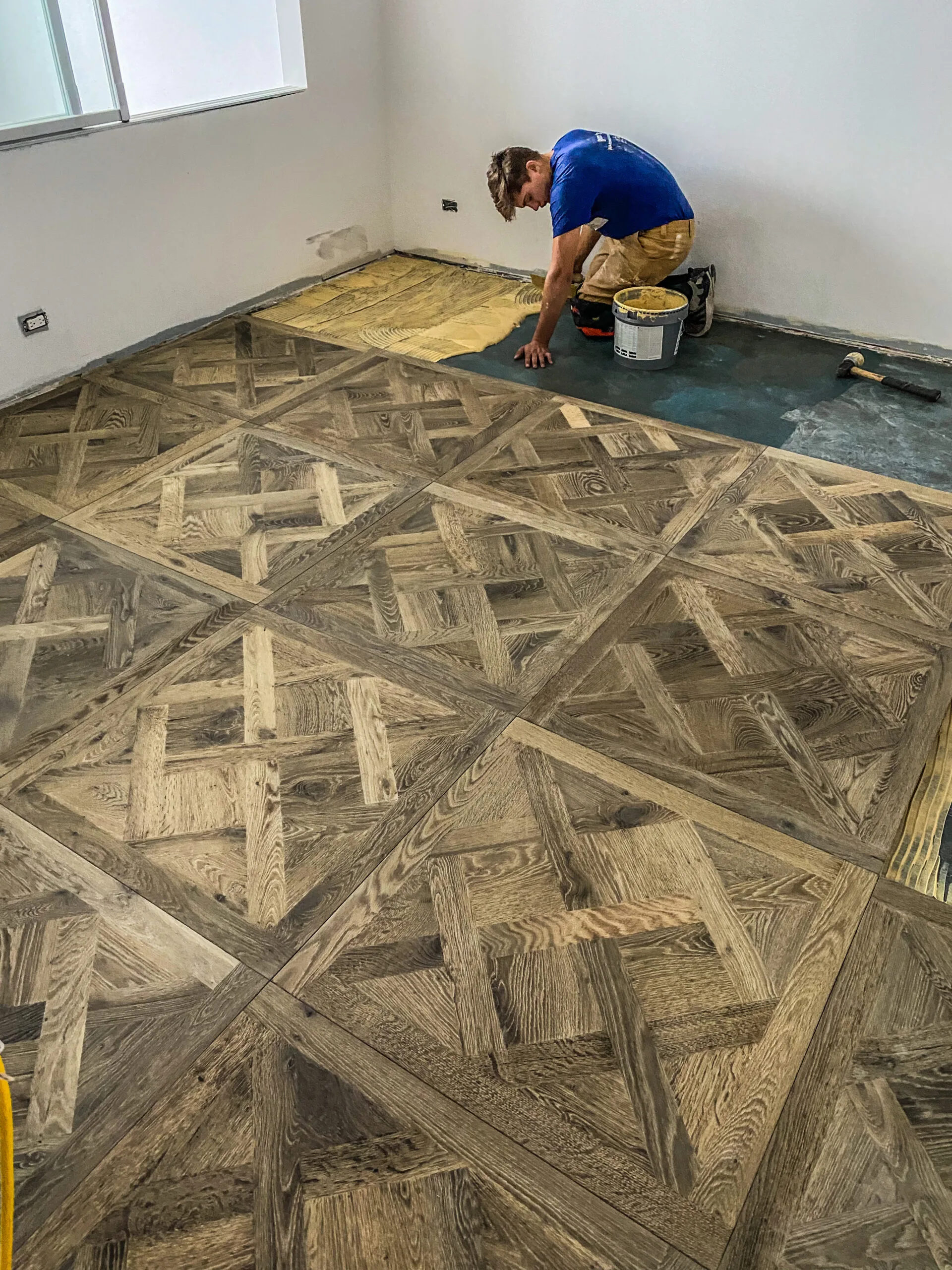 Unique Hardwood Floors Being Glued Down